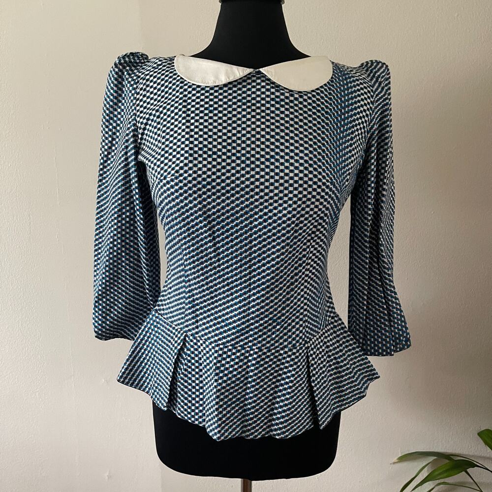 By Natacha Baco L'initiee Peplum Top Small Peter Pan Collar Exposed Zip Checked
